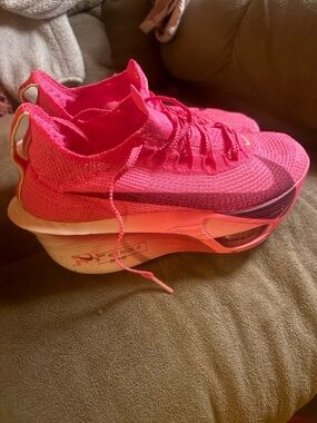 Nike Women's Hot Pink/Coral Flyknit Racing Shoe